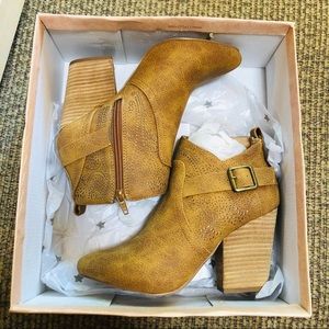 Brown ankle booties with buckle